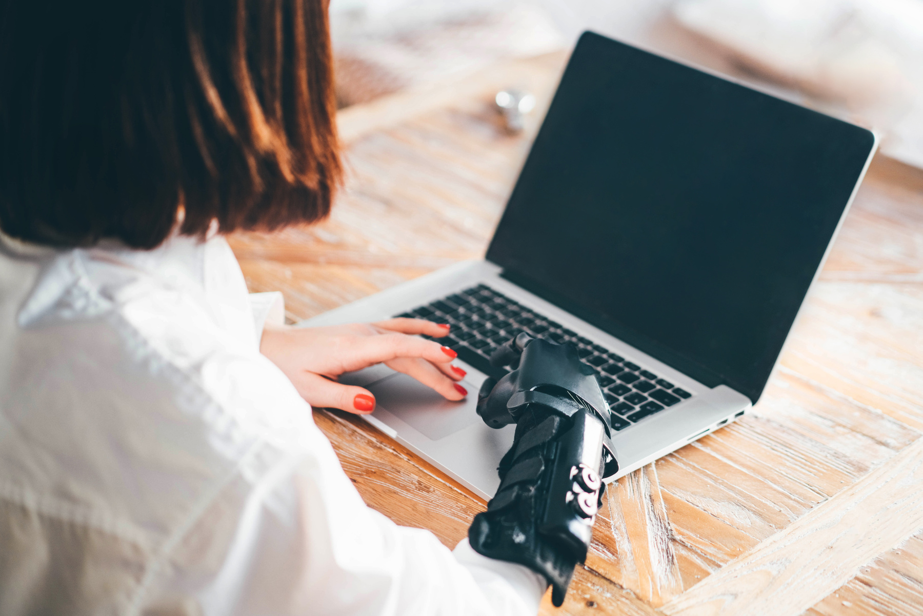 Disabled woman using computer.